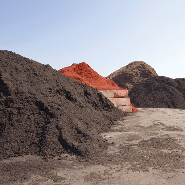 piles of mulch with vibrant colorant